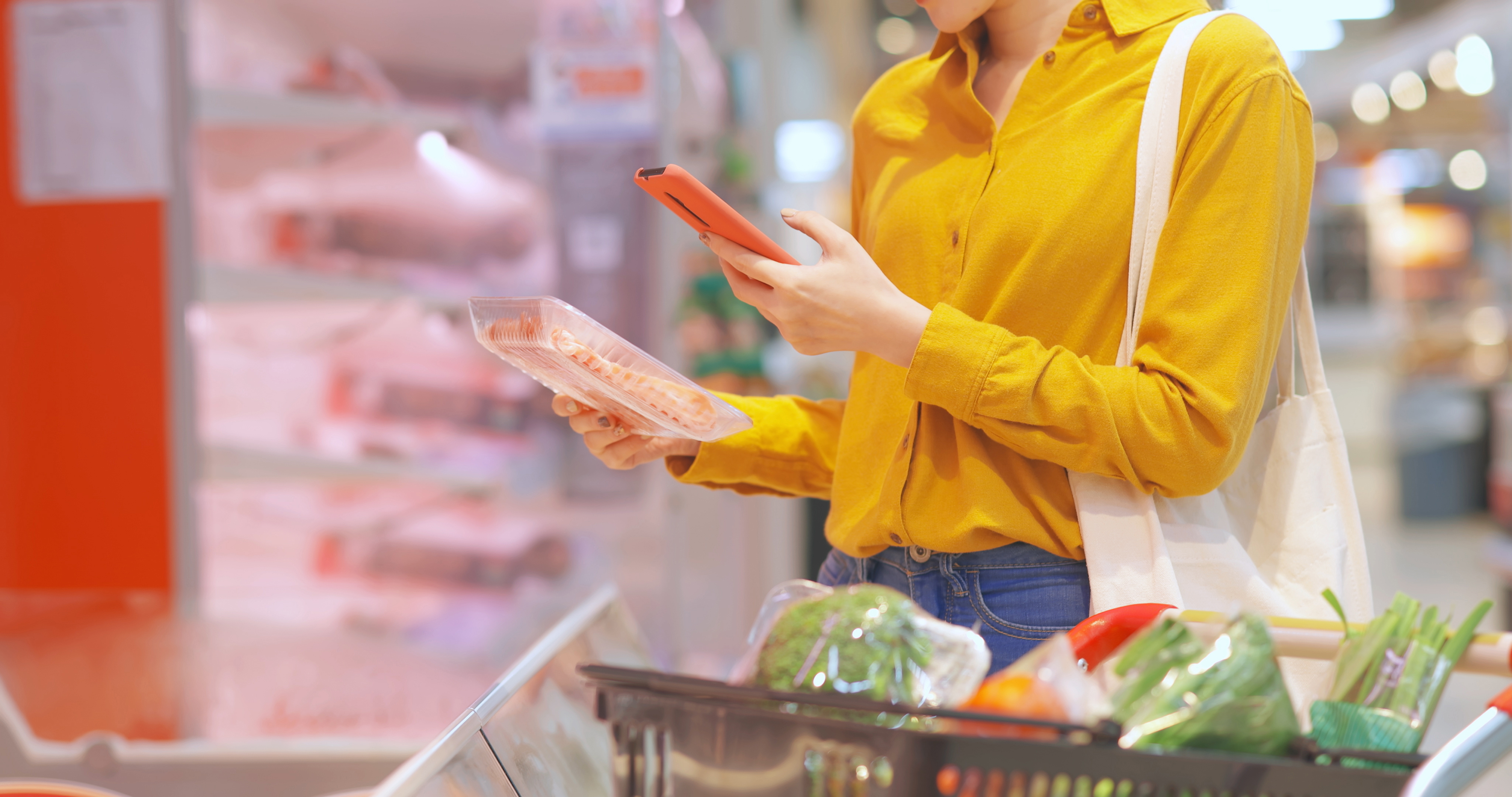 Woman checking food nutrition label